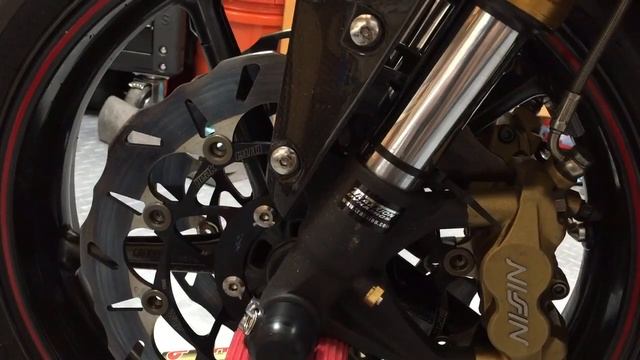 Motorcycles pads 'dragging' on rotor, not a problem (well, probably not)