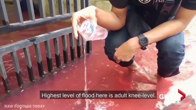 Red rivers run through Indonesian village as flood hits batik-manufacturing hub