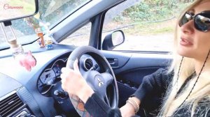 blonde crazy girl driving car in mud water road hard pedalpumps