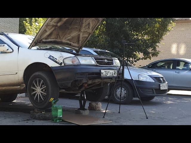 СНЯТИЕ ПОДДОНА И ПОРШНЕЙ ДВИГАТЕЛЯ GA15DE. смотреть онлайн