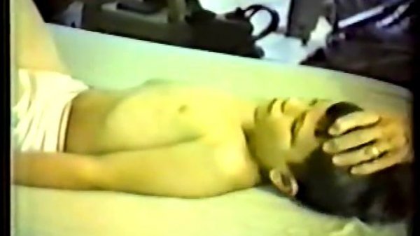 Dr. Ida Rolf (founder of Rolfing) treating a child