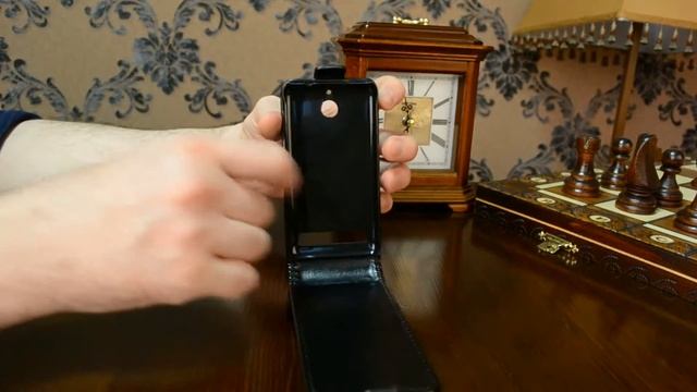 Фирменный откидной чехол-флип для Sony Xperia E1/ E1 Dual D2005/ D2105 черный кожаный смотреть онлайн