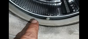 Как достать из стиральной машины инородный предмет.