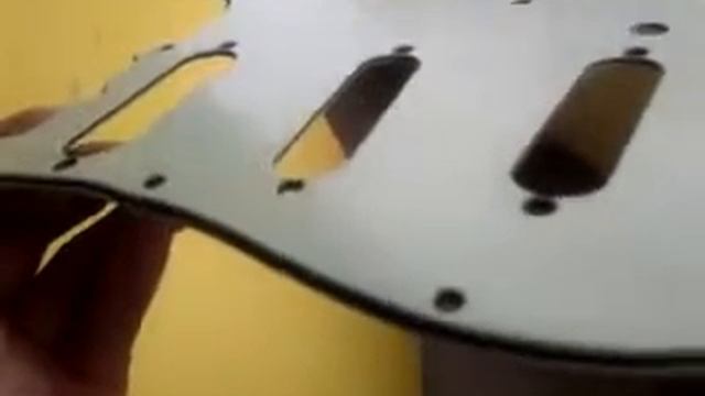 Glossy Surface Finish on an aged mint green pickguard from Flexguitars.com смотреть онлайн