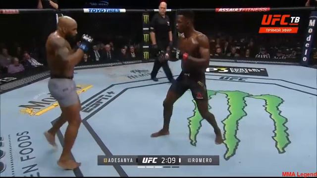 Исраэль Адесанья (ч) – Йоэль Ромеро