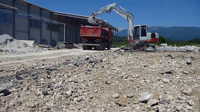 Loading Asphalt On Actros 3346 Lorry Whit Takeuchi TB1140