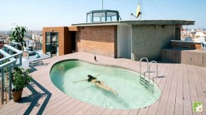 Проекты домов с плоской эксплуатируемой крышей – современные и практичные