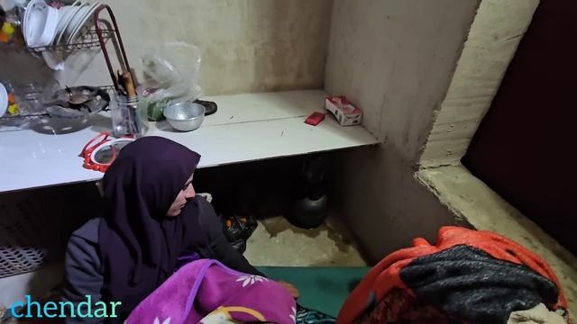 Debris Removal By The Father Under The Rain After The Destruction Of The House