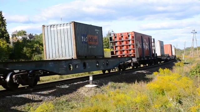 Тепловоз 2ТЭ116-1369 с поездом-контейнеровозом смотреть онлайн