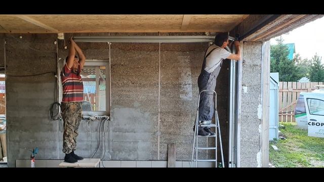 Установка секционных автоматических ворот. смотреть онлайн