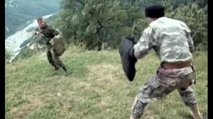 Стреляющие горы (2010). Финальный поединок Хасана с капитаном Меркурьевым