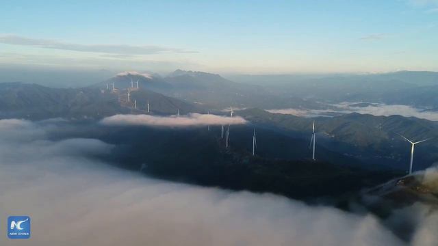 Picturesque wind farm in a sea of clouds in east China смотреть онлайн