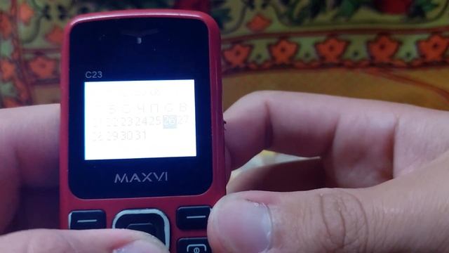 обзор на кнопочный телефон Maxvi C20
