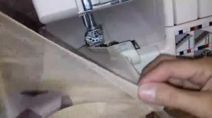 Обработка края вуали оверлоком. Роликовый шов.