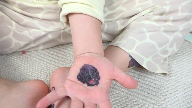 Funny Baby And Face Tattoo