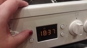 Как настроить время на плите Beko 57300