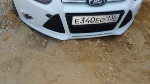 Как открыть заглушку в переднем бампере для буксировки Ford Focus 3?!