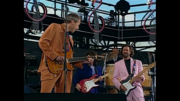 Dire Straits (feat. Eric Clapton) - "Money For Nothing" (Live At Knebworth 1990)