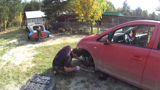 "Опель Корса Д" Замена реостата и тормозных колодок смотреть онлайн