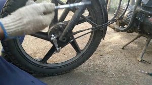 Как снять переднее колесо на мопеде альфа?
