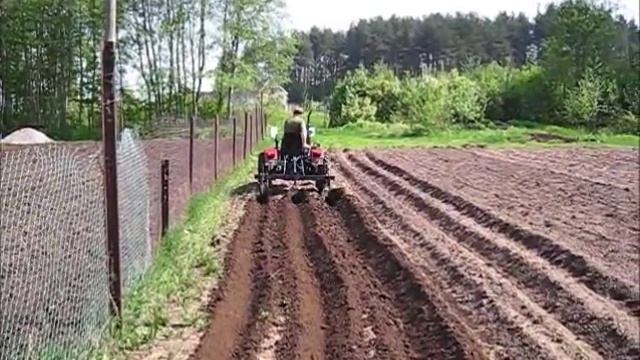 Культиватор-окучник на тракторе Уралец 180 смотреть онлайн