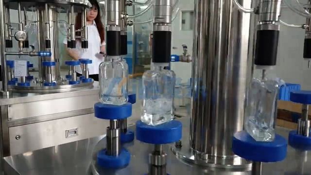 Semi-automatic ten-head rotary perfume filling machine смотреть онлайн