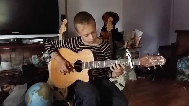 Юный виртуоз гитарист играет Tommy Emmanuel смотреть онлайн