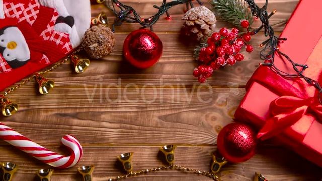 Different New Year's Toys Sweets and Flowers Lie on the Table. Top View | Stock Footage - Videohive смотреть онлайн