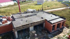 Монолитного перекрытия дома с плоской кровлей.