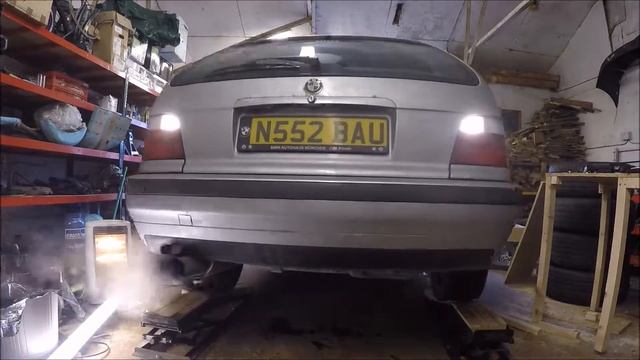 E36 328i touring - VLOG 3 - Exhaust repair, oil change, plugs get changed again смотреть онлайн