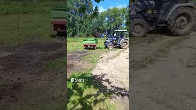 Погрузка земли трактором Скаут 504 смотреть онлайн