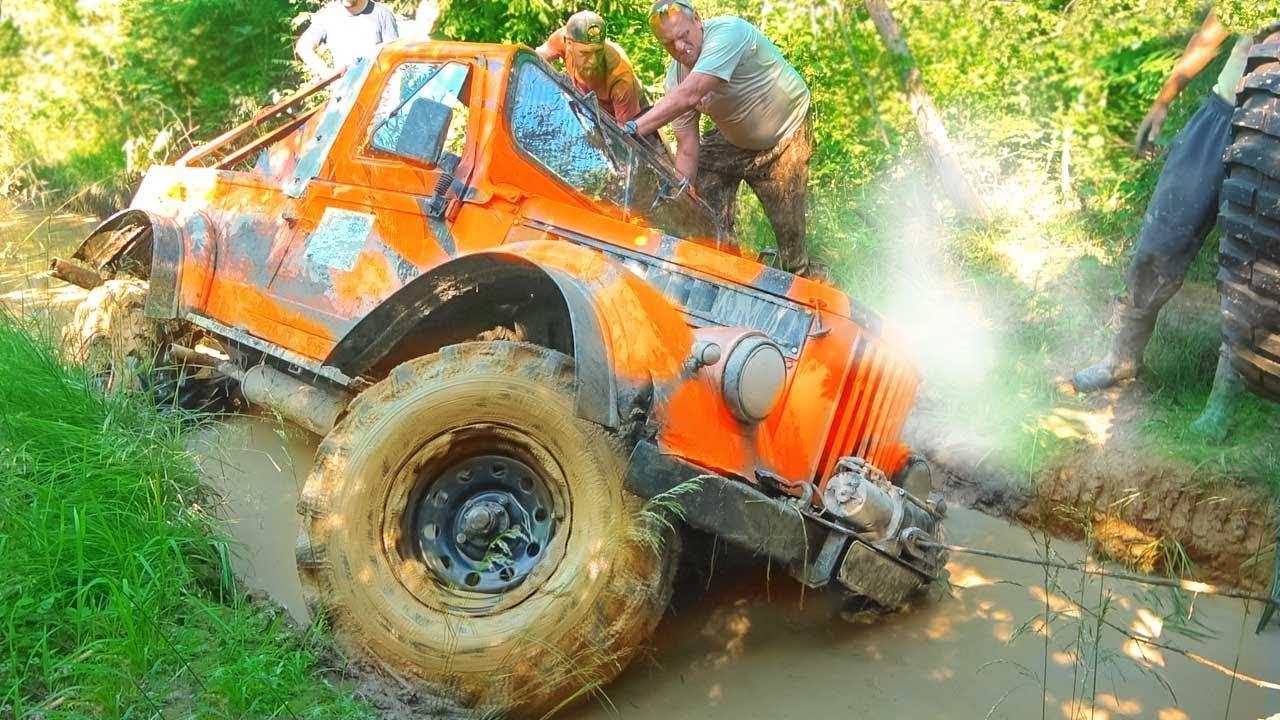 Внедорожники из СССР Газ 69 и Советский грузовик Газ 66 оффроад Волга на лютом бездорожье Jeep едет смотреть онлайн