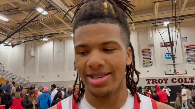 St. Mary’s basketball guard Trey McKenney reacts to 56-44 win over North Farmington in region final смотреть онлайн