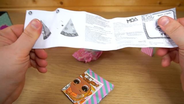 ЛОЛ СЮПРИЗ ПОДАРОК В КАРТОННОЙ КОРОБКЕ L.O.L Surprise! Present Surprise Doll with 8 Surprises смотреть онлайн