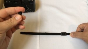 Attach a Neck strap to your DSLR camera...The Canon way!!!
