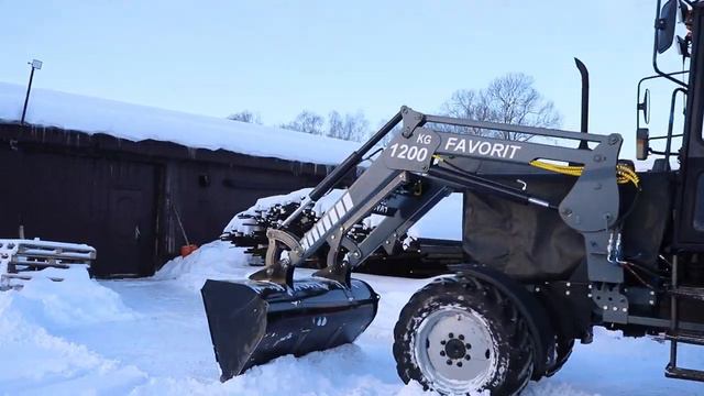 Погрузчик на МТЗ Фаворит 1200 Оптима в работе смотреть онлайн
