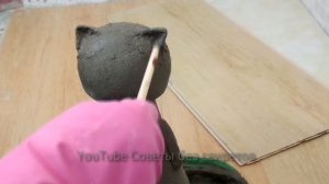 Из чулка и цемента получился котейка. Фигурки для сада своими руками.