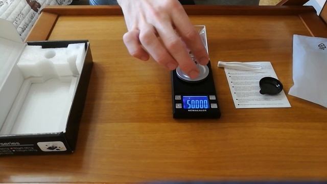 Калибровка портативных сверхточных весов Newacalox 8028 смотреть онлайн