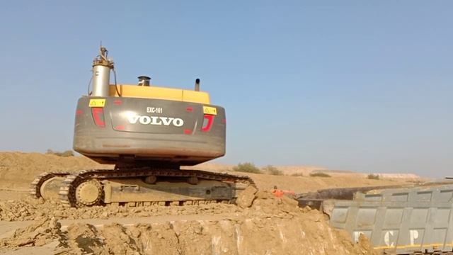 Volvo EC480DL Excavator Loading Trucks