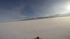 Снегоход Динго T125 по снегу с водой