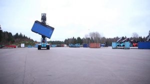 Спредер с функцией наклона для разгрузки контейнеров с сыпучим грузом