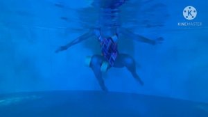 Aquaaerobics. Water exercises with dumbbell.