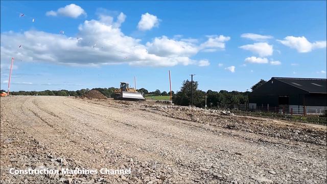 Komatsu D65 PX dozer machine working on a road construction site смотреть онлайн