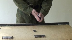 Снаряжения магазина автомата Калашникова  патронами.