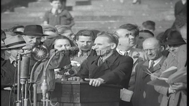 Ernst Reuter and Scharnofsky address a crowd during a political rally in Berlin, ...HD Stock Footag смотреть онлайн
