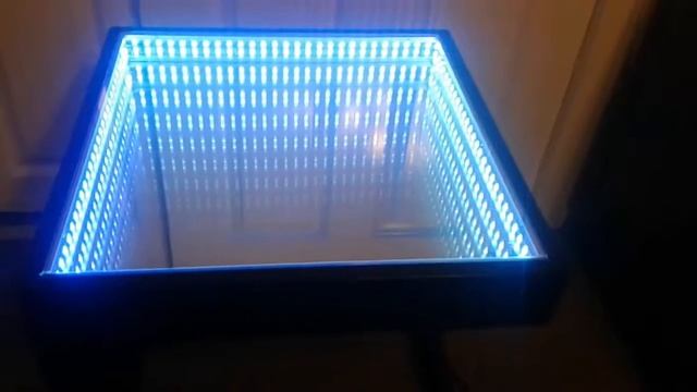 Sleek And Stylish Black Infinity Mirror Coffee Table