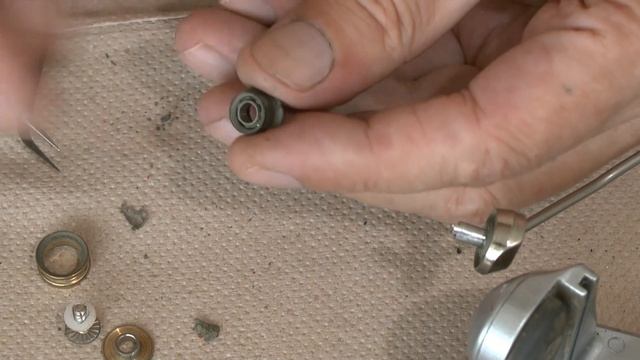 Ролик лесоукладывателя рыболовной катушки.