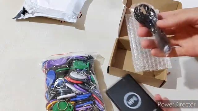 Как скопировать ключ домофона Eltis алиэкспресс программатор распаковка Aliexpre.mp4