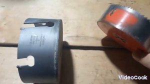 сверление бревна для дымохода котла.