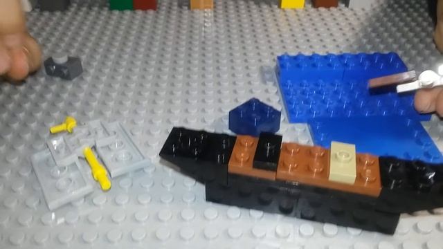 Лего корабль с двумя парусами.Lego ship with two sails. смотреть онлайн